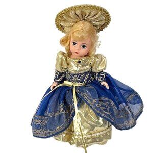 Madame Alexander restrung 8" Blue Angel doll with stand.